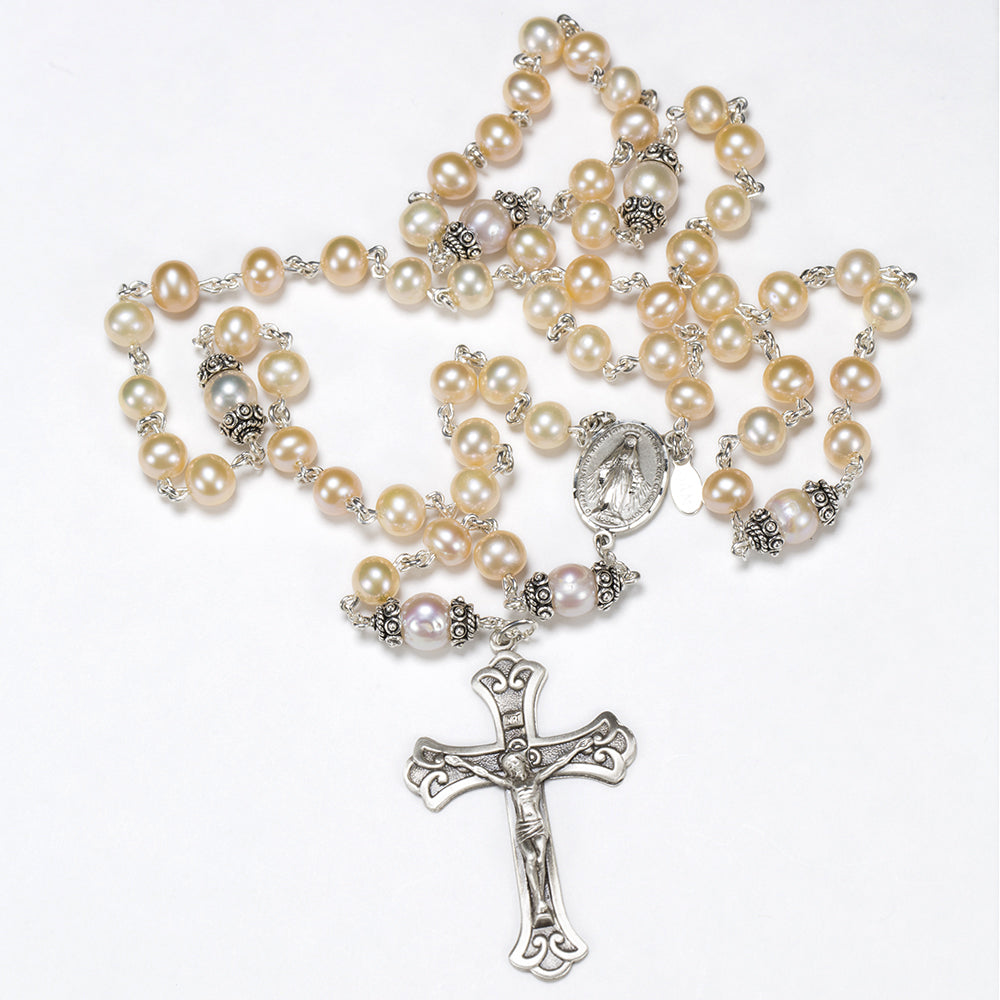 Catholic Women's Rosary handmade with cream and peach colored freshwater pearls