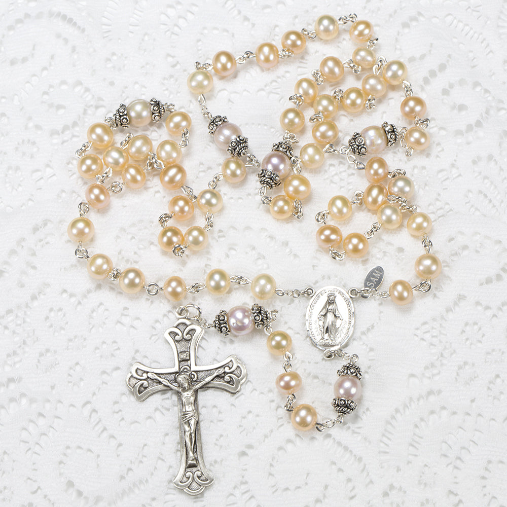 Catholic Women's Rosary handmade with cream and peach colored freshwater pearls