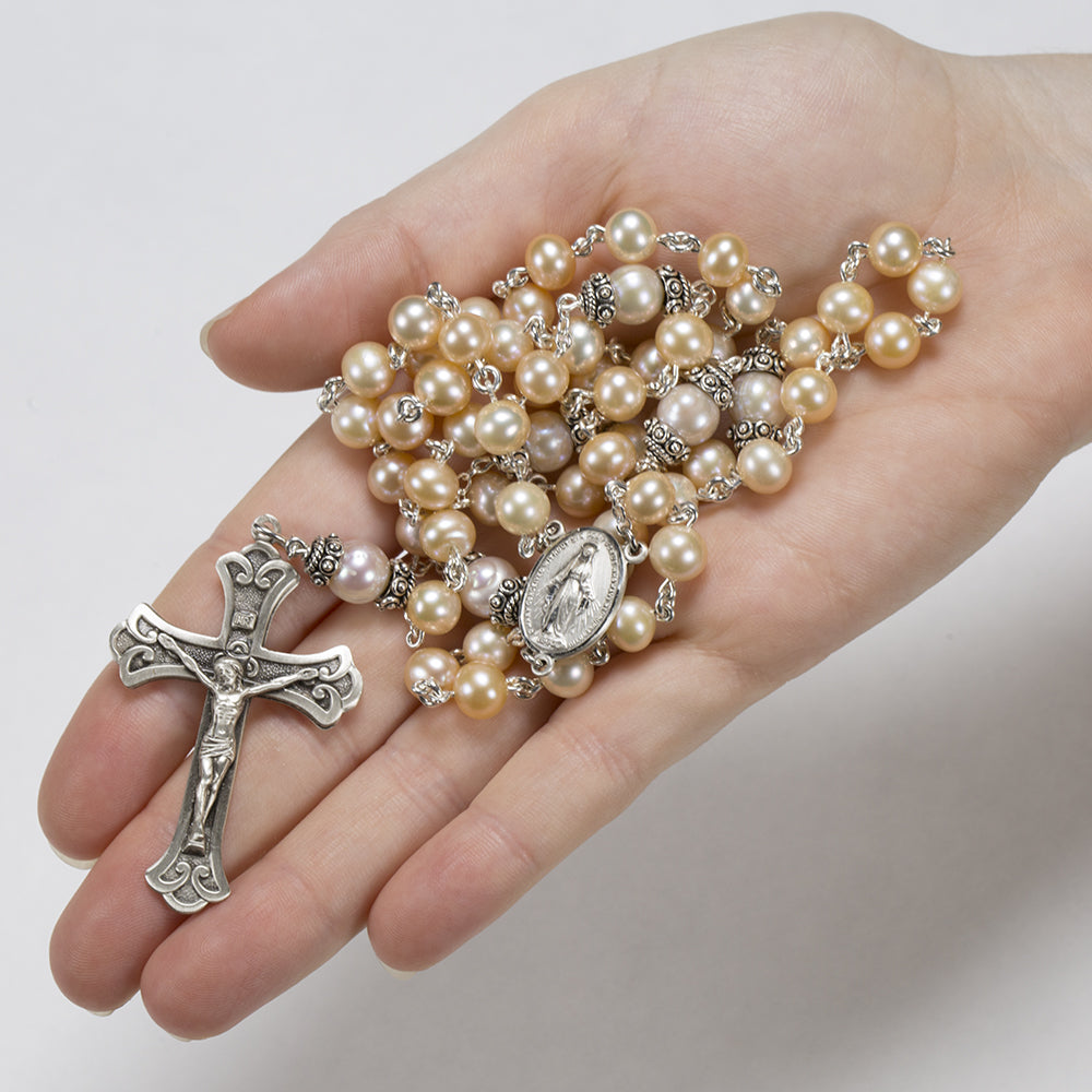 Catholic Women's Rosary handmade with cream and peach colored freshwater pearls