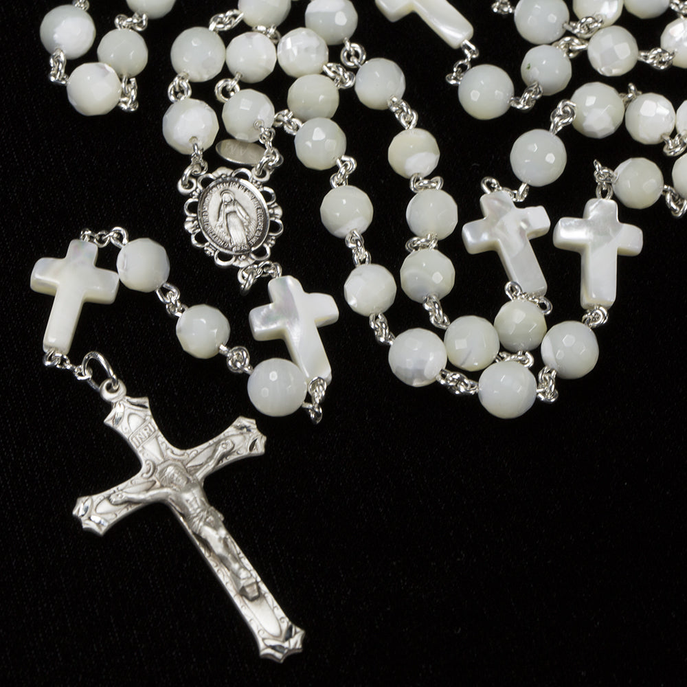 Handmade, Heirloom Catholic Rosary with Mother of Pearl beads shaped like crosses.