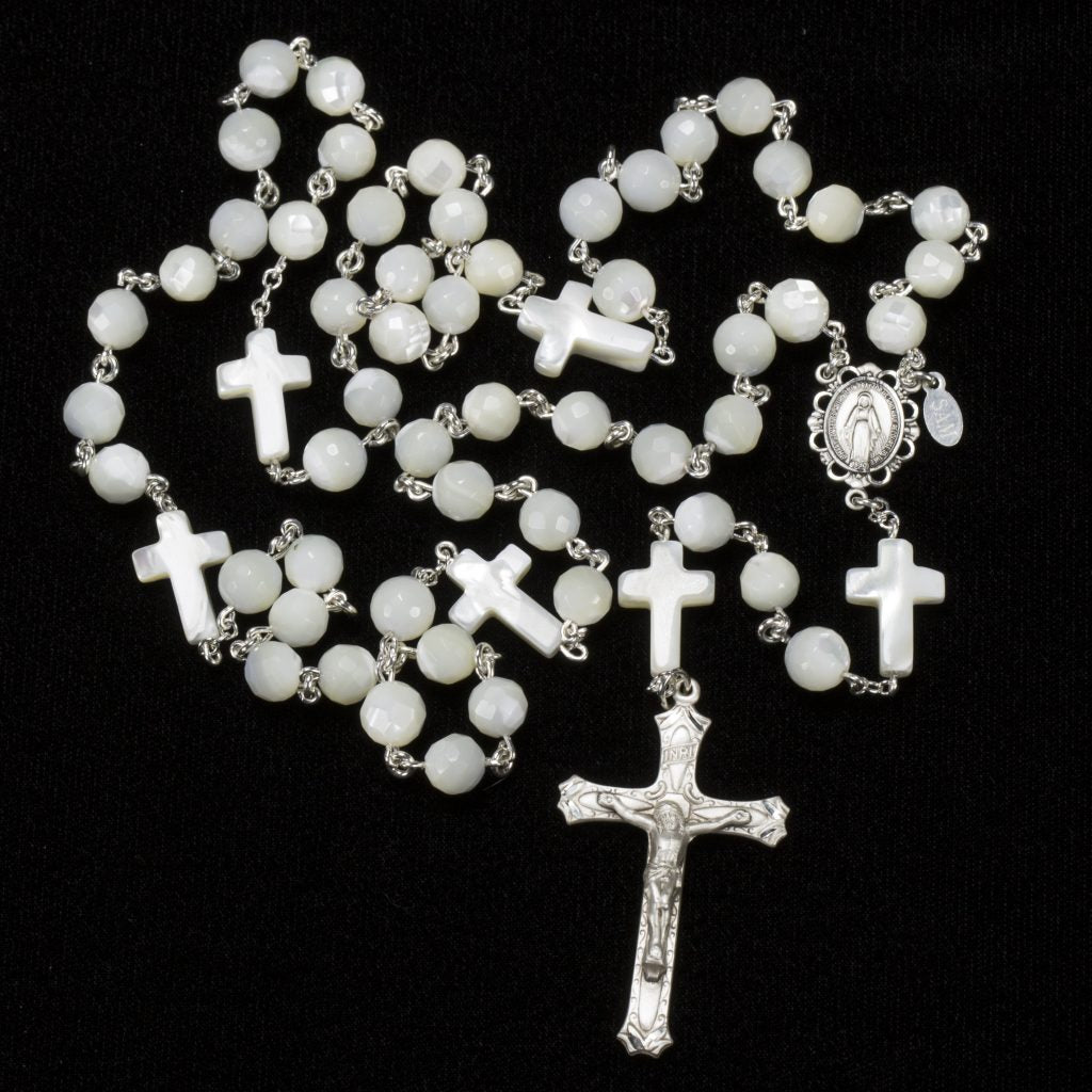 Handmade, Heirloom Catholic Rosary with Mother of Pearl beads shaped like crosses.