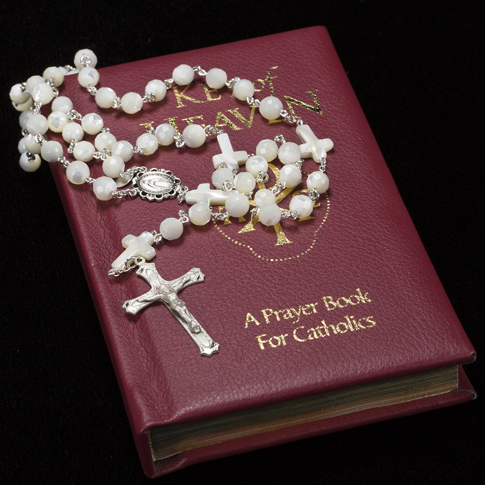 Handmade, Heirloom Catholic Rosary with Mother of Pearl beads shaped like crosses.