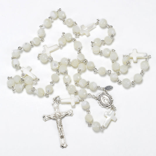 Handmade, Heirloom Catholic Rosary with Mother of Pearl beads shaped like crosses.
