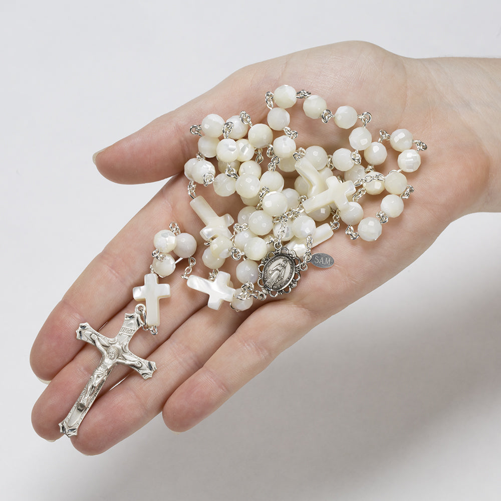 Handmade, Heirloom Catholic Rosary with Mother of Pearl beads shaped like crosses.